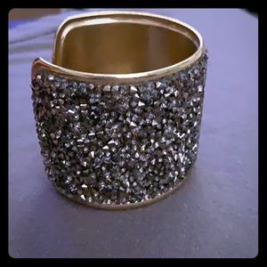 Thick gold gray gemmed cuff
